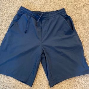 Lululemon Mens shorts, size small, 9inch inseam, navy blue.